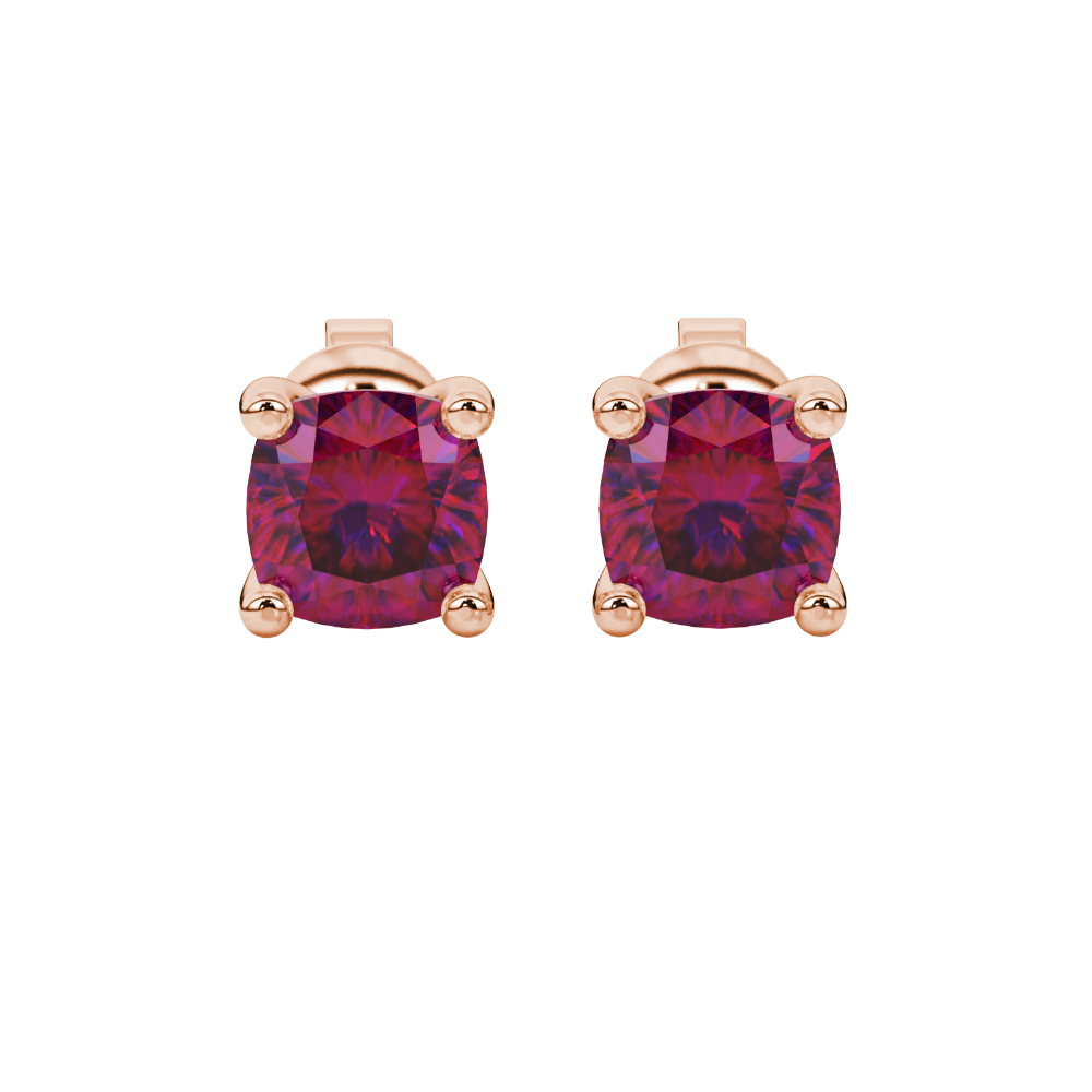 Red cushion cut gemstone solitaire stud earrings in gold featuring a refined four-prong basket setting