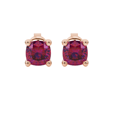 Red cushion cut gemstone solitaire stud earrings in gold featuring a refined four-prong basket setting