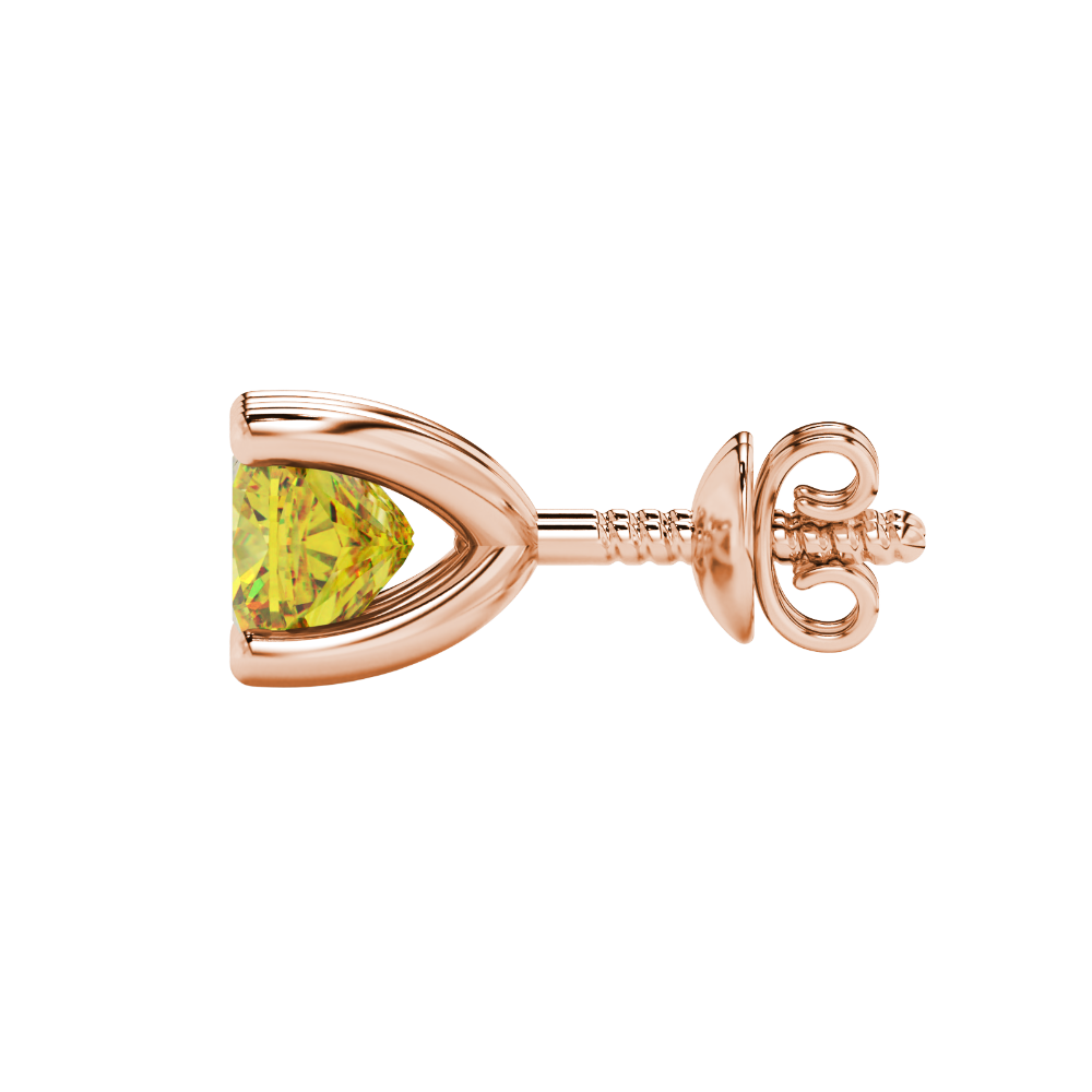 Yellow cushion cut gemstone solitaire stud earrings in gold featuring a refined four-prong basket setting