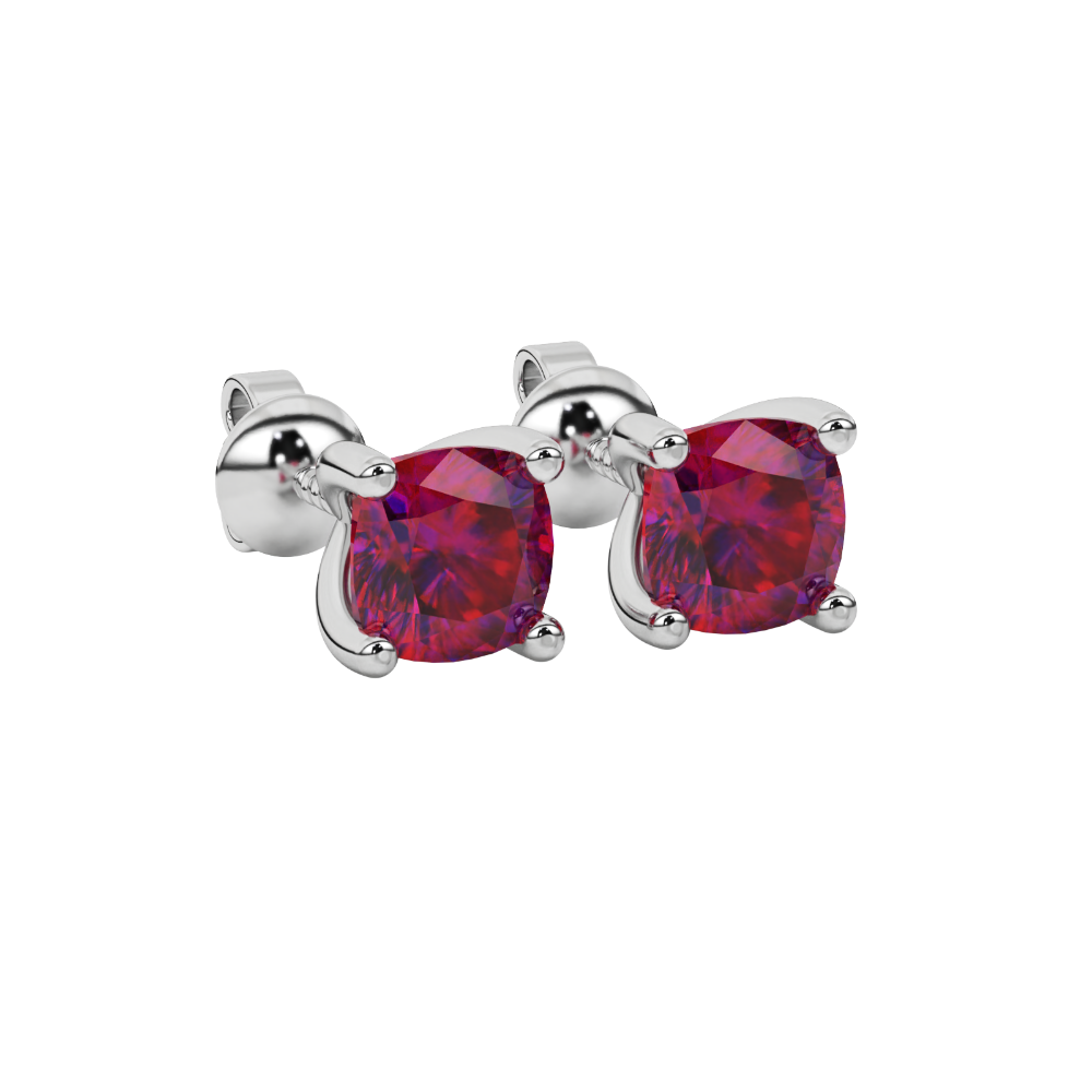 Red cushion cut gemstone solitaire stud earrings in gold featuring a refined four-prong basket setting