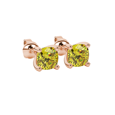 Yellow cushion cut gemstone solitaire stud earrings in gold featuring a refined four-prong basket setting