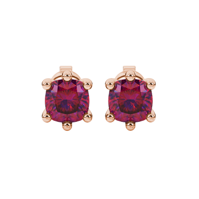 Red cushion cut gemstone stud earrings in gold featuring a refined six-prong basket setting