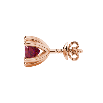 Red cushion cut gemstone stud earrings in gold featuring a refined six-prong basket setting