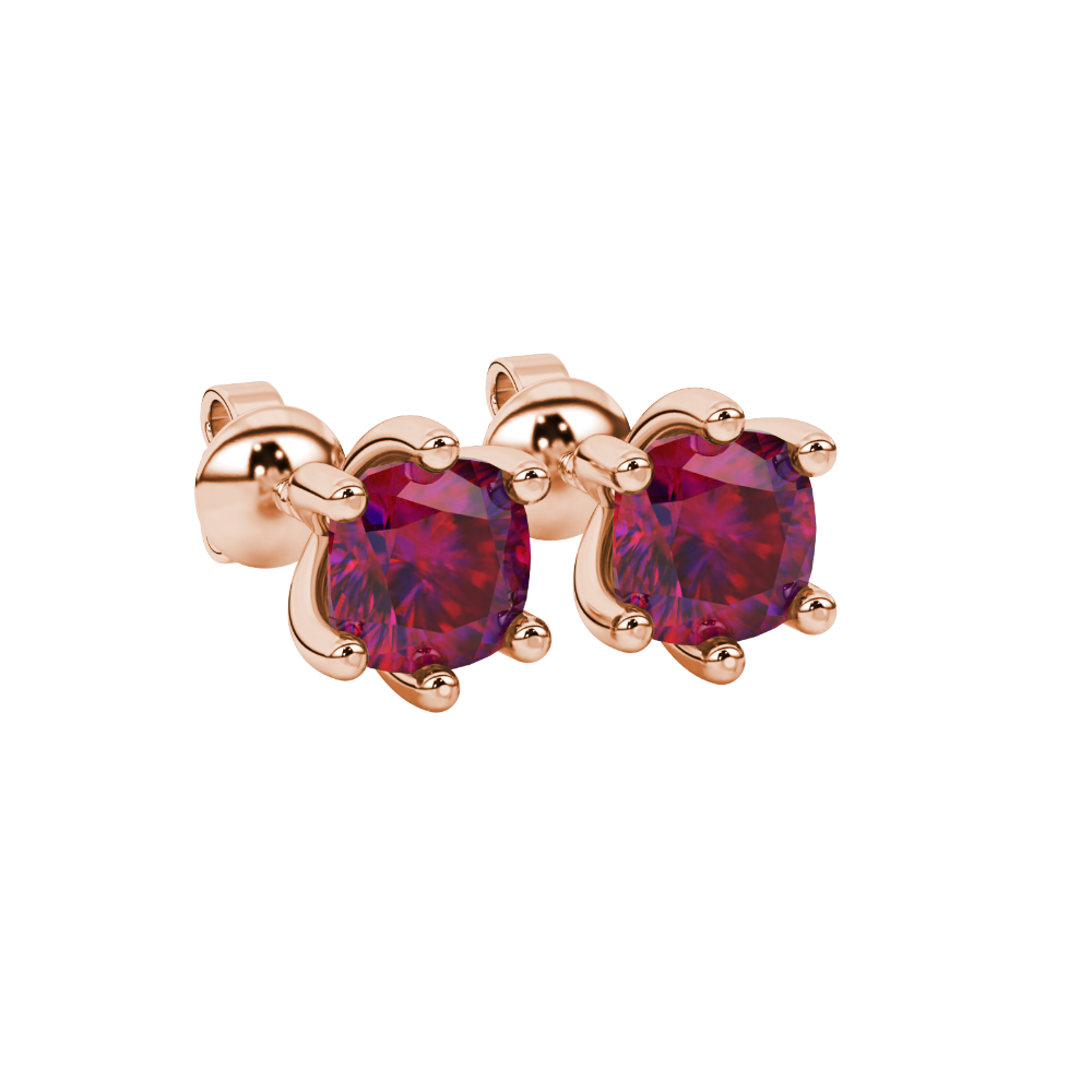 Red cushion cut gemstone stud earrings in gold featuring a refined six-prong basket setting