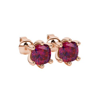 Red cushion cut gemstone stud earrings in gold featuring a refined six-prong basket setting