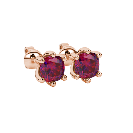 Red cushion cut gemstone stud earrings in gold featuring a refined six-prong basket setting
