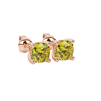 Yellow cushion cut gemstone stud earrings in yellow gold with four-prong basket setting