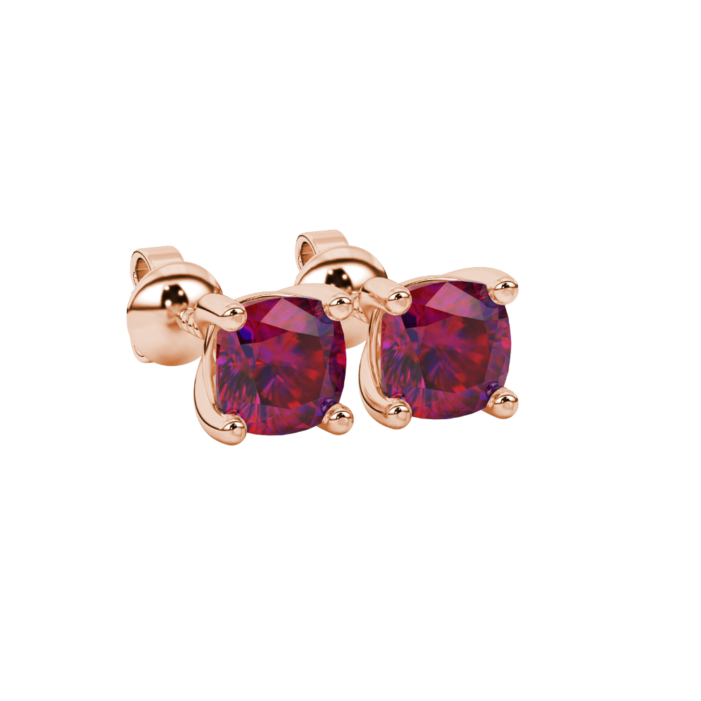 Red cushion cut gemstone stud earrings in white gold with four-prong basket setting