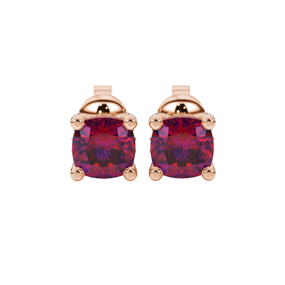 Red cushion cut solitaire gemstone ring in rose gold with classic four prong setting