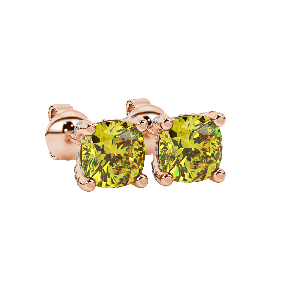 Yellow cushion cut solitaire gemstone ring in rose gold with classic four prong setting