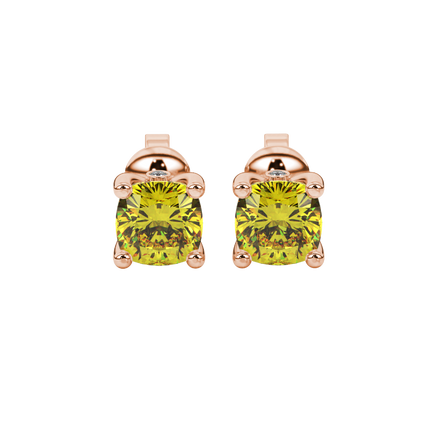 Yellow cushion cut solitaire stud earrings with accent diamonds in yellow gold four prong setting