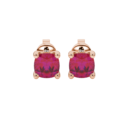 Red cushion cut solitaire stud earrings with accent diamonds in white gold four prong setting