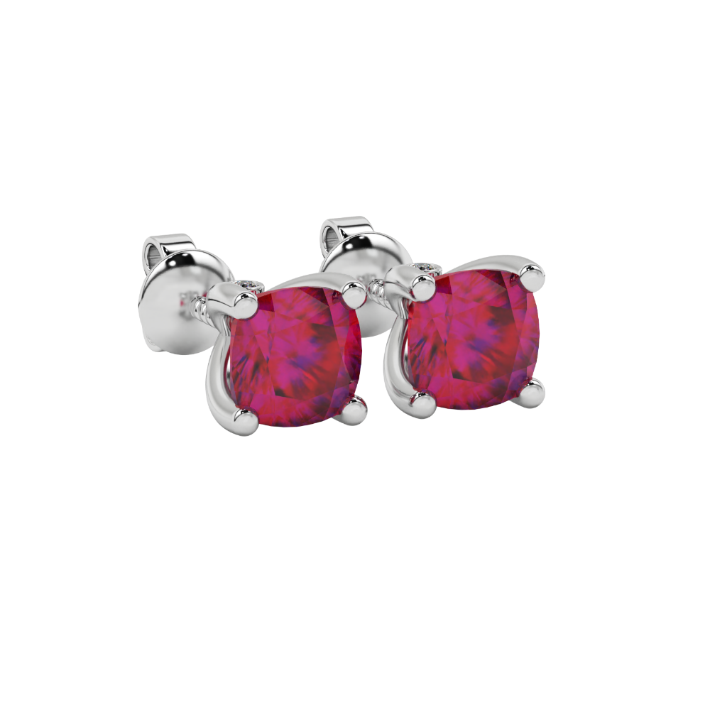 Red cushion cut solitaire stud earrings with accent diamonds in white gold four prong setting