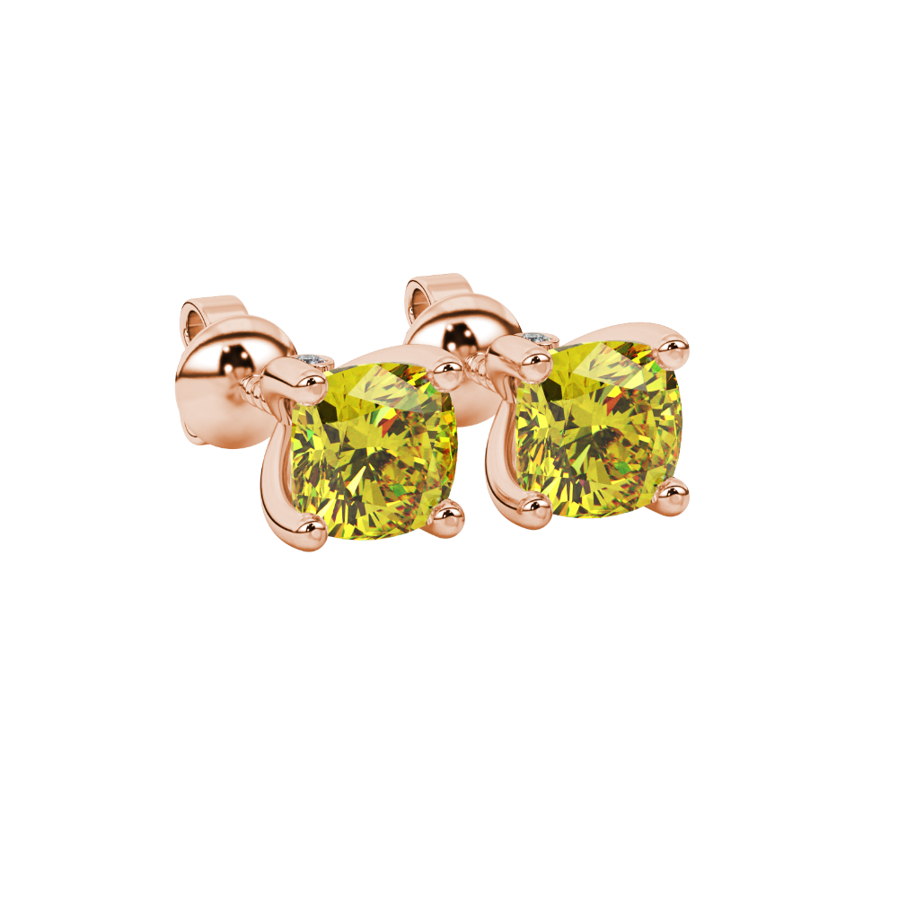 Yellow cushion cut solitaire stud earrings with accent diamonds in yellow gold four prong setting
