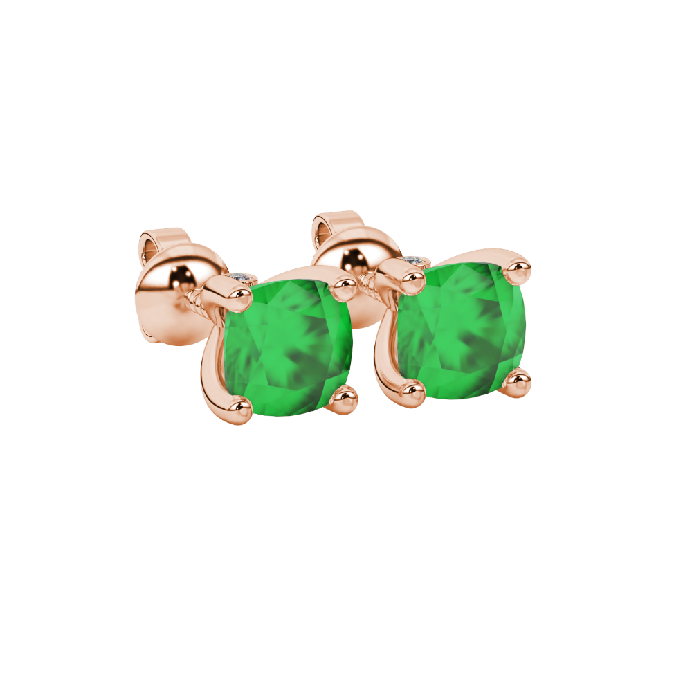 Green cushion cut solitaire stud earrings with accent diamonds in white gold four prong setting