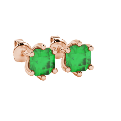 close-up shot of radiant-cut emerald green gemstone stud earrings with a classic rose gold six-prong setting