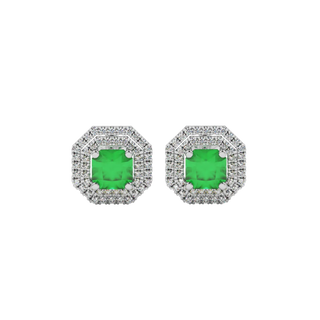 Radiant-cut emerald green gemstone stud earrings in a white gold falling edge halo setting.