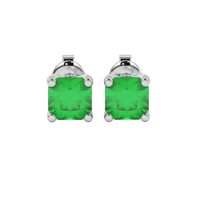 Radiant-cut emerald green gemstone stud earrings in a white gold surprise diamond setting.