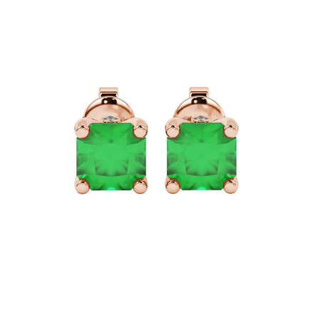Radiant-cut emerald green gemstone stud earrings in a rose gold surprise diamond setting.