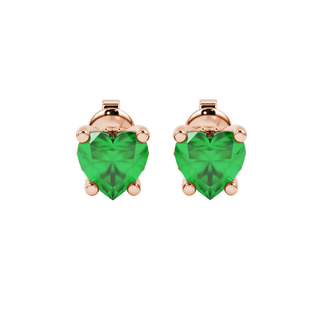 Close-up angled shot of Emerald Green heart cut lotus basket halo earrings in rose gold