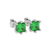 Close-up emerald green gemstone earing, white gold six-prong setting.