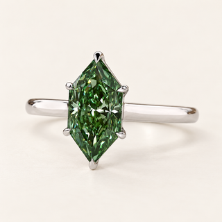 Green Dutch marquise cut lab grown diamond solitaire engagement ring with protective pointed-end prongs, four side claws and plain polished white gold shank.