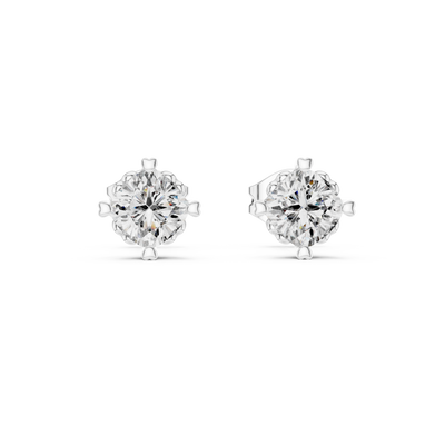 Cushion cut solitaire stud earrings in gold