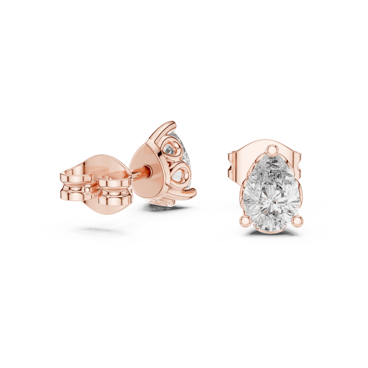 Pear cut solitaire diamond stud earrings in gold with lab grown diamonds