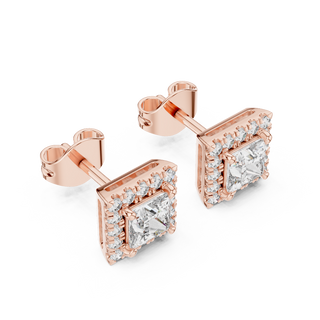 Side profile of rose gold princess halo diamond stud earrings.