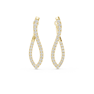 Front view of Twisting Radiance diamond drop earrings in yellow gold.