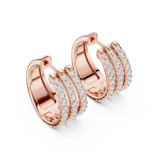 Side profile of rose gold triple row diamond hoop earrings.