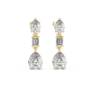 Front view of Cascade Elegance pear and emerald cut diamond drop earrings in yellow gold.