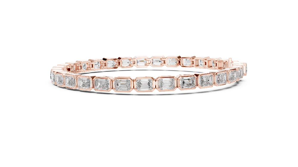 Rose gold bracelet with diamond accents on a white background