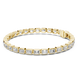 Gold bracelet with diamond accents on a white background