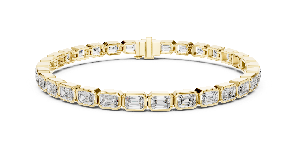 Gold bracelet with diamond accents on a white background