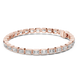 Rose gold bracelet with diamonds on a white background