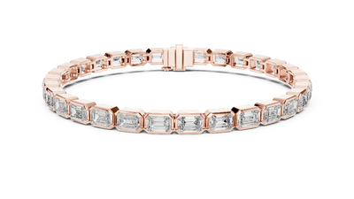 Rose gold bracelet with diamond accents on a white background