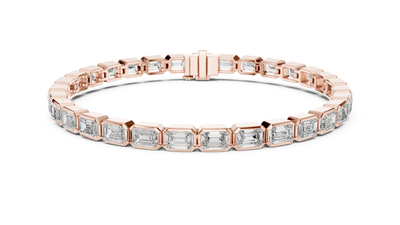 Rose gold bracelet with diamond accents on a white background