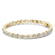 Gold bracelet with diamonds on a white background