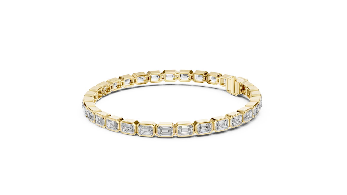 Gold bracelet with diamonds on a white background