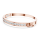 Channel set lab grown diamond bangle bracelet in yellow gold white gold and rose gold with sleek round diamond design