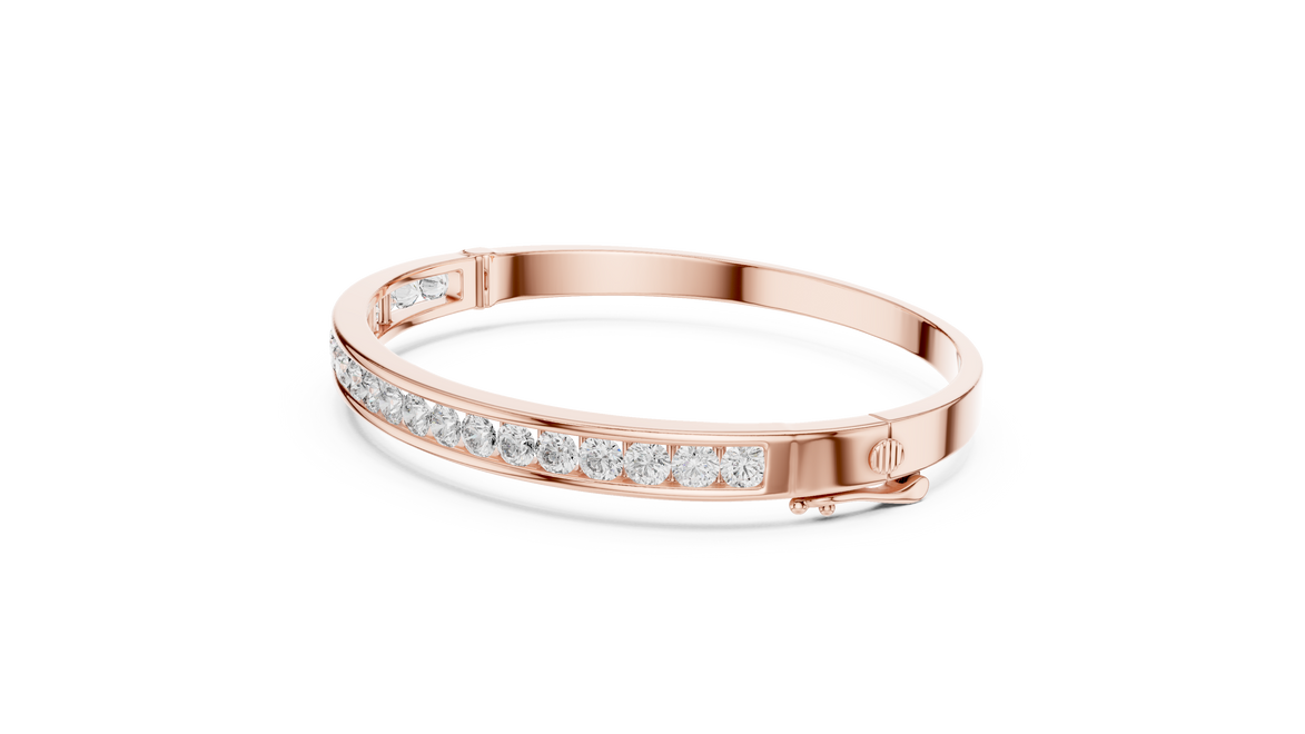 Channel set lab grown diamond bangle bracelet in yellow gold white gold and rose gold with sleek round diamond design
