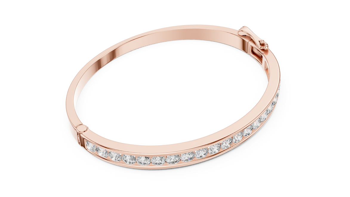 Rose gold bracelet with clear stones on a white background