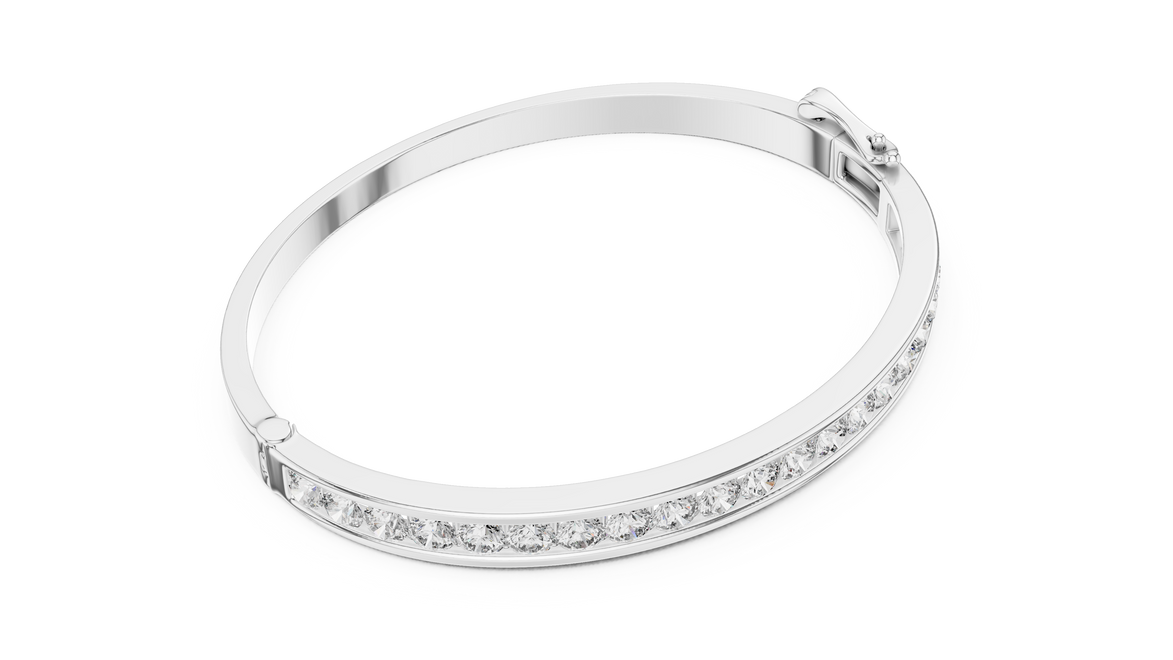 Silver bracelet with clear stones on a white background