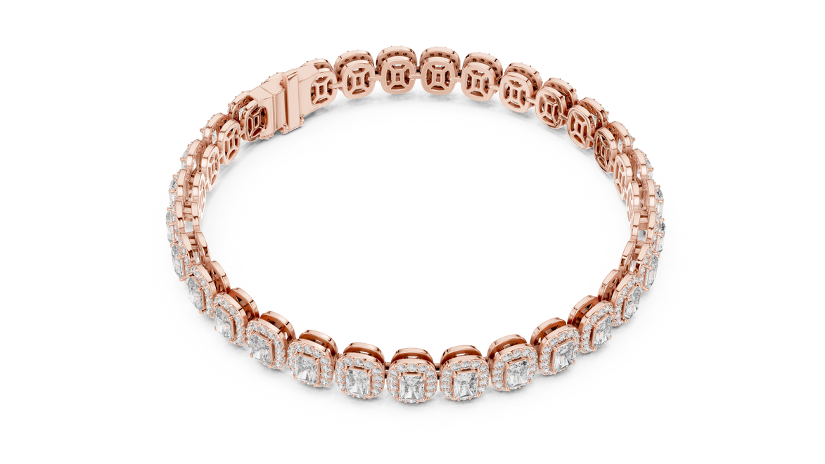 Gold bracelet with diamond accents on a white background