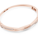 Twisted lab grown diamond bangle bracelet in yellow gold white gold and rose gold with modern crossover diamond design