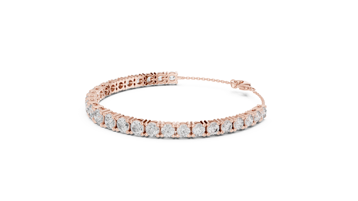 Graduated lab grown diamond tennis bracelet in yellow gold white gold and rose gold with round brilliant diamond design