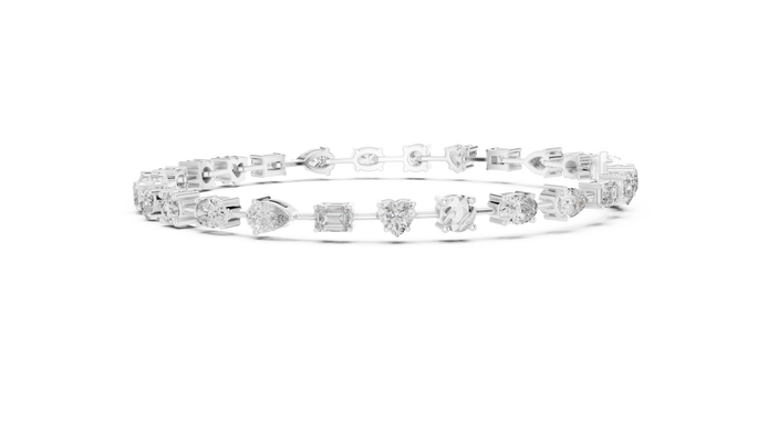 Multi shape lab grown diamond tennis bracelet with round heart oval pear and emerald cut diamonds in gold variations
