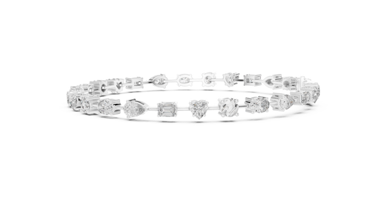 Multi shape lab grown diamond tennis bracelet with round heart oval pear and emerald cut diamonds in gold variations
