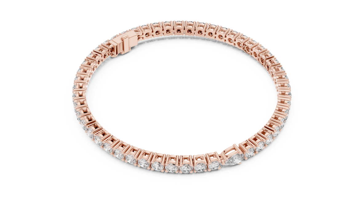 Pear accent lab grown diamond tennis bracelet with round diamonds and central pear cut diamond in gold variations